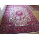 A hand knotted woollen Meshed rug, 3.45m x 2.55m