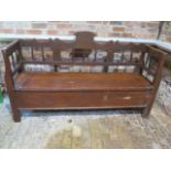A 19th century Continental pine bench with a lift up seat with useful storage, 106cm tall x 181cm xx
