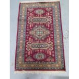 A hand knotted woollen fine Mori Jaldar rug, 123cm x 80cm