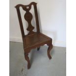 An 18th century Dutch oak side chair on shaped legs with good colour in polished condition