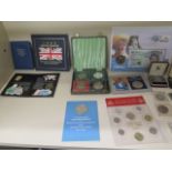 A collection of assorted coins to include a boxed set of 24ct gold state quarters and a masonic