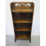 A small oak bookcase 101cm tall x 42cm x 17cm