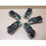 Five tinplate friction drive VW police cars, made by Huki, all marked made in West Germany under