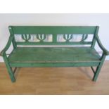 A 19th century green painted Continental pine bench, 87cm tall x 150cm x 50cm