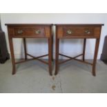 A pair of new burr wood lamp tables each with a drawer on splayed legs united by cross stretchers,