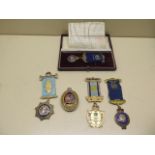 Four silver Buffalo medals, one boxed with certificate, and one masonic silver jewel, total weight