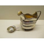 A silver cream jug London 1807, and a silver shell salt and plated spoon, total weight approx 5