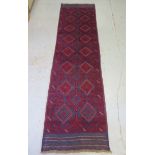 A hand knotted woollen Meshwani runner, 240cm x 62cm