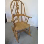 A modern beechwood rocking chair, 117cm tall