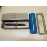 A Parker fountain pen and a Parker ballpoint pen both boxed, generally good, ballpoint working,