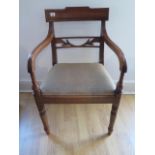 A mahogany carver chair on ring turned legs