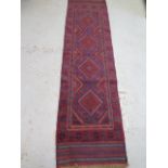 A hand knotted woollen Meshwani Runner, 226cm x 60cm, in good condition