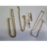 Three 9ct yellow gold necklaces, one with pendant, longest 52cm and two 9ct yellow gold brooches,