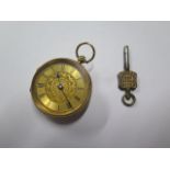 An 18ct yellow gold pocket watch, 35mm case, key wind with key and running, total weight approx 40