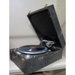 A Columbia Model 201 portable wind up gramophone, working, some wear to case, with a small selection