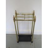 An early 20th century brass and iron umbrella stand, 59cm tall x 29cm x 18cm, in good polished