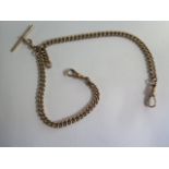 A 9ct 375 yellow gold double Albert watch chain, each link marked 375 9 some general wear, clasps