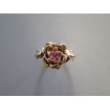 A hallmarked Elizabeth of Glamis Rose ring, a jewelled ring crafted of 2 shades of 14ct gold set