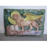 A terracotta plaque of the Lion of St Mark symbol of Venice, 50cm x 70cm, this has been broken and