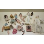 A collection of small dolls and figures, tallest doll is 16cm