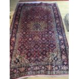 A hand knotted woollen Fien Bijar rug, 2.05m x 1.30m, in good condition