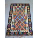 A hand knotted woollen Chobi Kilim rug, 158cm x 103cm, in good condition