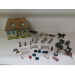 A collection of lead figures and a Lucie Attwell Kiddibics money box