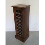 An oak 16 bottle wine rack made by a local craftsman to a high standard, 97cm tall x 33cm x 28cm