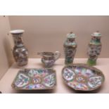 Six pieces of Famille Rose including a single vase, a pair of lidded vases 25cm tall, a jug and