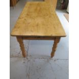 A Victorian style stripped pine Kitchen table with a drawer, 76cm tall x 83cm x 180cm waxed and