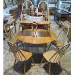 An Ercol light elm dropleaf kitchen table and 6 stickback chairs, 72cm tall 112cm and 123cm