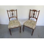 A pair of Edwardian inlaid rosewood side chairs