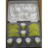 A Shelley yellow china 6 setting coffee set with silver holders, boxed, in good condition