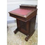 A Victorian mahogany Davenport desk with 4 active drawers and fitted correspondence top, 88cm tall x