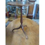 An inlaid Mahogany tripod side table 70 cm tall 45 diameter .