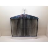 A Rolls Royce original chrome radiator grill with Spirit of Ecstasy and emblem, possibly for a