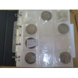 A collection of silver and other coinage dating from Elizabeth I to Elizabeth II and 7 x 20