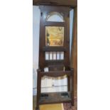 A Mahogany mirrorback hallstand . one hook broken , another missing 198 cm tall 68 wide