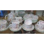A Minton Haddon Hall 8 setting tea set with 8 x 23cm plates and 8 x 16cm plates, missing sugar bowl,