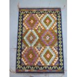 A hand knotted woollen Chobi Kilim rug, 118cm x 82cm, in good condition