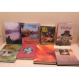 A collection of 8 fishing related books: Barbel signed Trefor West; The Carp Years signed, limited