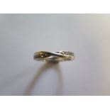 A hallmarked 9ct white gold diamond band ring, size M, approx 2 grams, small usage marks otherwise