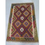 A hand knotted woollen Maimana Kilim rug, 152cm x 99cm