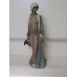 A large Lladro figure semi nude woman watercarrier, 58cm tall, in good condition