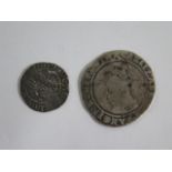 An Elizabeth I silver coin and a Henry VIII silver penny
