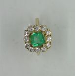 A good vintage yellow gold emerald and diamond ring, emerald approx 1.5ct, diamonds approx 1ct, size