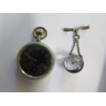 A small silver globe lapel watch- not running and a military pocket watch BB3597 30 hour luminous