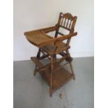 A late Victorian / Edwardian folding child's high chair