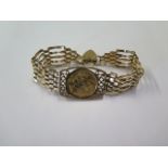 A 9ct yellow gold bracelet set with a George V gold full sovereign dated 1912, total weight approx