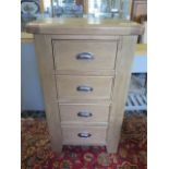An ex display Canterbury Oak 4 drawer chest retail £260 100 cm tall 59 x 40 cm